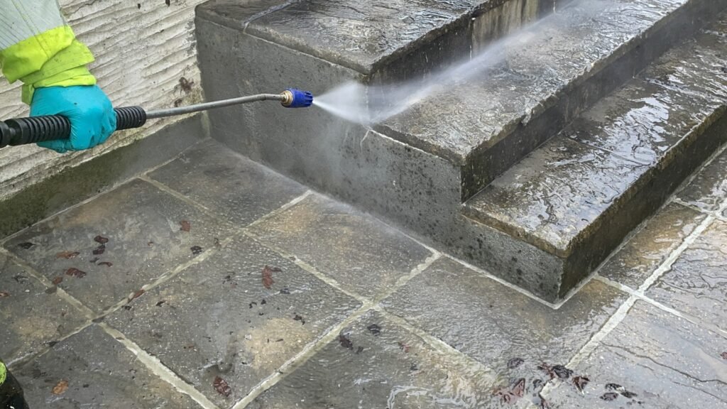 Pressure washing in action