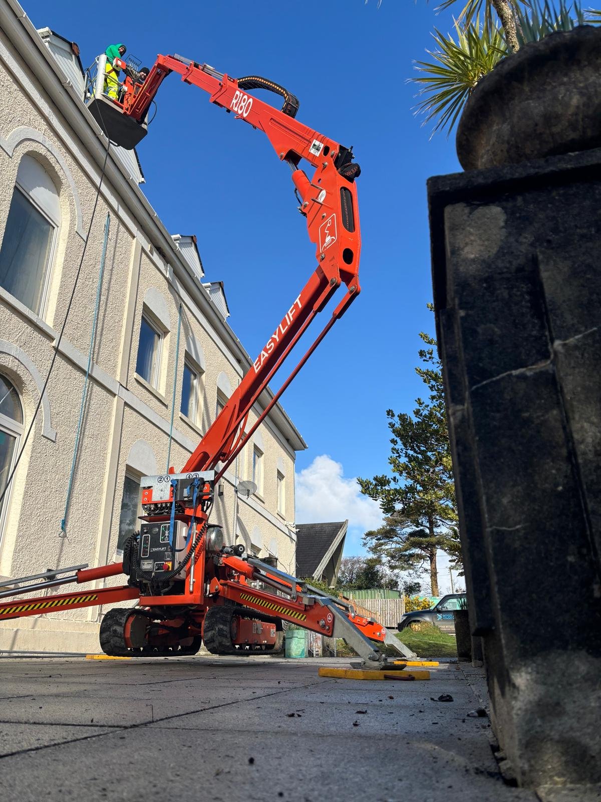 High reach pressure washing using a MEWP